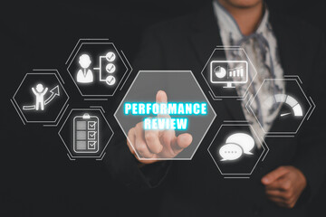 Performance review concept, Businesswoman hand touching  performance review icon on virtual screen.