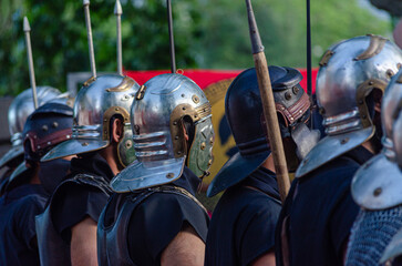 Men equipped as a Roman legionary, at a historical reenactment party.
