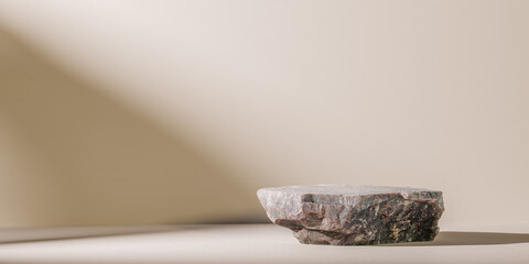 product presentation. empty natural stone, slab. beige background and shadow from window. Luxury...