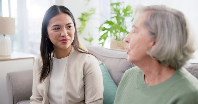 Consulting, talking and woman with a financial advisor for retirement planning, meeting and home care. Finance, help and a consultant speaking with senior person on the sofa for legal advice together