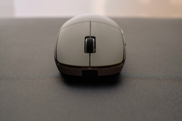 close up computer mouse wireless on the desk for background