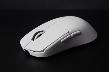 White mouse computer gaming closeup on black background