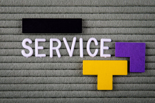 SERVICE Concept. White letters of the alphabet on a green background