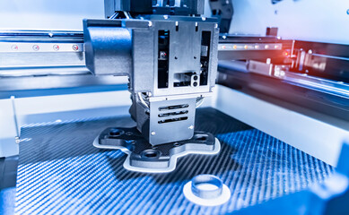 3D printer or additive manufacturing and robotic automation technology.