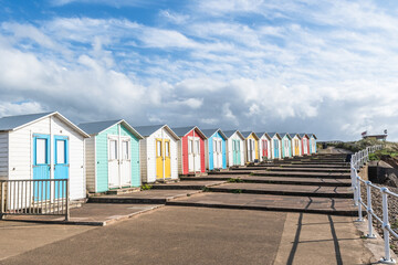 Colourful beach huts at Summerleaze Beach in Bude, Cornwall, England