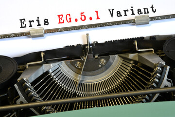 Covid-19 new ERIS EG.5.1 Variant. Conceptual words 'ERIS EG.5.1 Variant' typed on vintage typewriter.