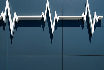 Decorative cardiogram curve on the wall of the medical center