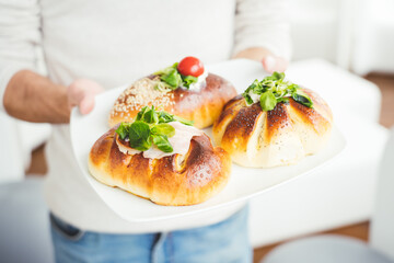Sicilian rotisserie calzone with seeds. Traditional street food in Palermo, Sicily, Italy
