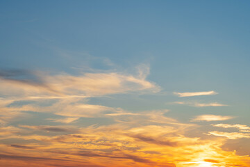 summer evening, sunset in yellow, orange and pink with clouds, background