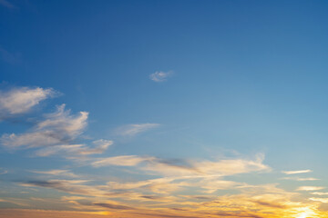 summer evening, sunset in yellow, orange and pink with clouds, background