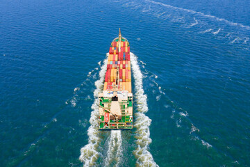 Aerial top view Container ship full load container on sea, for logistics , shipping , import export...