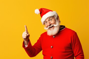 Fototapeta na wymiar Portrait of Santa Claus showing thumbs up, isolated on yellow background.Generative Ai