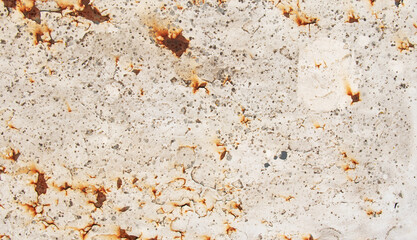 Rusted white painted metal wall. Rusty metal background with streaks of rust. Rust stains.