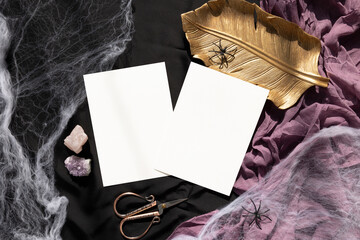 Halloween 5x7 invitation cards mockup on black background with spider and web
