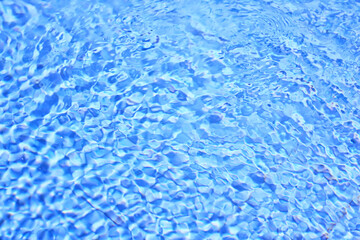 texture of transparent clear water in the pool blue abstract background