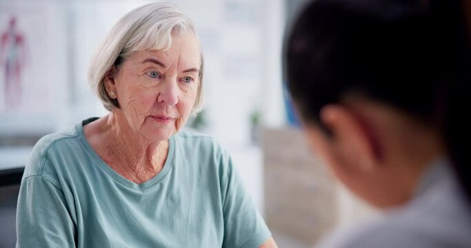 Talking, senior woman and doctor with consultation, advice or medical appointment with feedback, checkup or diagnosis. Old person, elderly patient or healthcare professional with help or conversation