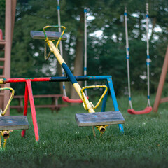 The colorful old horse swing on the playground
