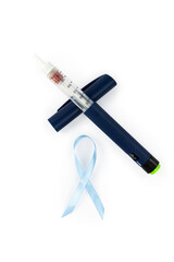 Insulin syringe pen with needle to fight diabetes and blue ribbon isolated on white background