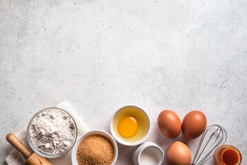 Obraz na płótnie Canvas Baking background with flour, eggs, rolling pin.