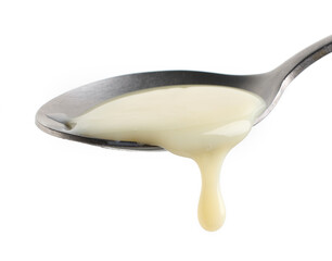 condensed milk in a spoon