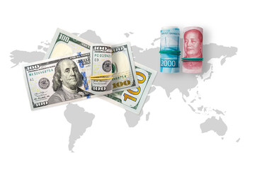 100 US dollars, ruble and 100 yuan banknotes on the world map. Yuan is the currency of the China. Rubles is the currency of the Russian Federation