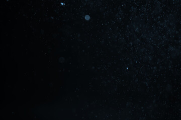 Abstract bokeh lights with blue background