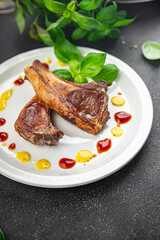 lamb cutlet on the bone fresh meat portion food ready to eat healthy appetizer meal food snack on the table