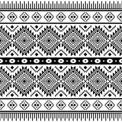 Navajo tribal abstract geometric background. American indigenous seamless pattern. Ethnic textile design for fabric template and shirt. Black and white color.