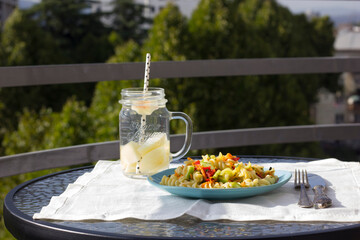 Pasta salad with fresh vegetables.