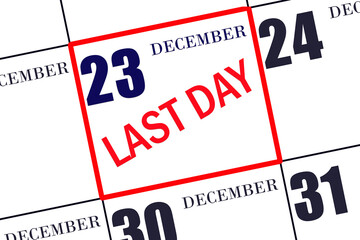 Text LAST DAY on calendar date December 23. A reminder of the final day. Deadline. Business concept.