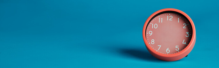 pink clock without hands, banner format