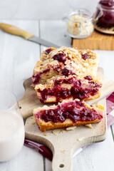 Cherry pie on a wooden cutting board. Homemade cherry pie. wooden background.