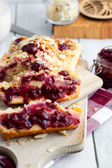 Cherry pie on a wooden cutting board. Homemade cherry pie. wooden background.