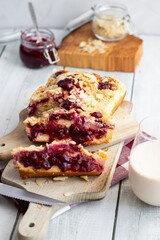 Cherry pie on a wooden cutting board. Homemade cherry pie. wooden background.
