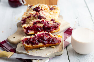 Cherry pie on a wooden cutting board. Homemade cherry pie. wooden background.