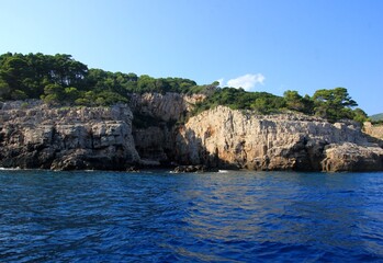 Fototapeta na wymiar Lokrum island in the Adriatic Sea near Dubrovnik, Croatia. Beautiful blue water of the Adriatic Sea in the foreground