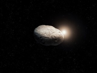Asteroid in the rays of the sun. Cratered celestial body. Realistic meteorite on a background of...