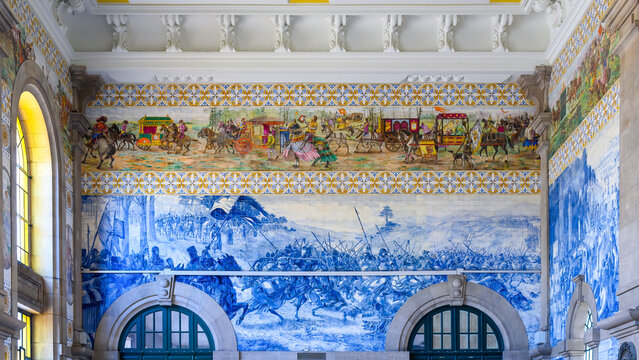 Old tile decoration in the Sao Bento railway station (1904) in Porto, Portugal