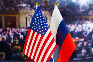 The US flag, Russian flag. Flag of USA, flag of Russia. The United States of America and the Russian Federation confrontation. Russia's invasion of Ukraine