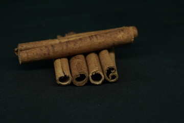 Cinnamon barks , isolated on black bakground,