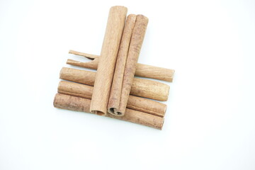 Cinnamon sticks isolated on white background, top down view