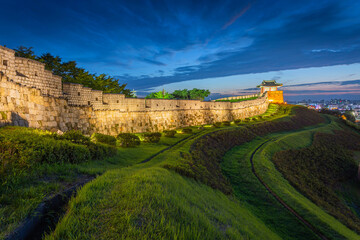 Naklejka premium Old city wall at Hwaseong Fortress, Traditional Architecture of Korea at Suwon, South Korea.