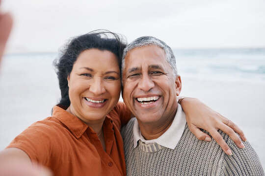 Ocean, senior or selfie portrait of happy couple with love, smile or support for a romantic bond together. Beach, old man or elderly woman taking photograph or picture memory in retirement in nature