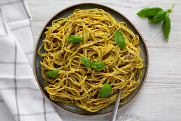 Homemade Vegan Pesto Pasta on a Plate, top view. Close-up.