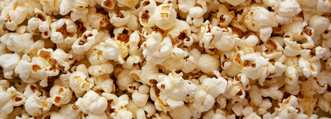 Homemade Buttered Popcorn with Salt, top view. Flat lay, overhead, from above.