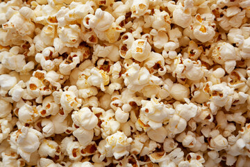 Homemade Buttered Popcorn with Salt, top view. Flat lay, overhead, from above.