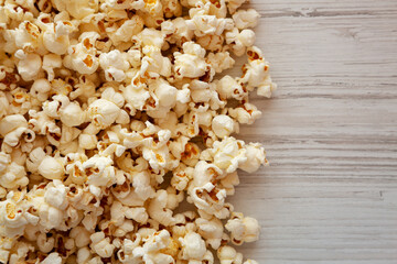 Homemade Buttered Popcorn with Salt, top view. Flat lay, overhead, from above. Copy space.
