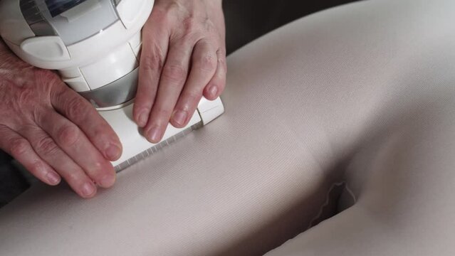 LPG massage - hands of massagist massaging woman