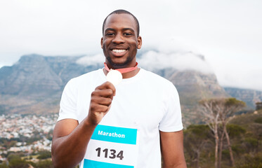 Runner man, winner and medal in portrait for marathon, competition or race with smile in Cape Town....