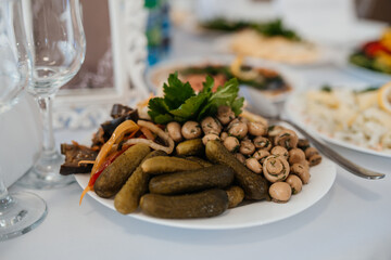 wedding, festive table, glasses, bottles of champagne and alcoholic cocktails	
